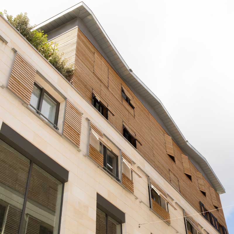 looking up at mixed use building